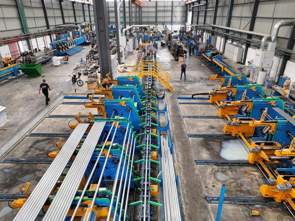 Large industrial manufacturing facility with machinery and production lines.