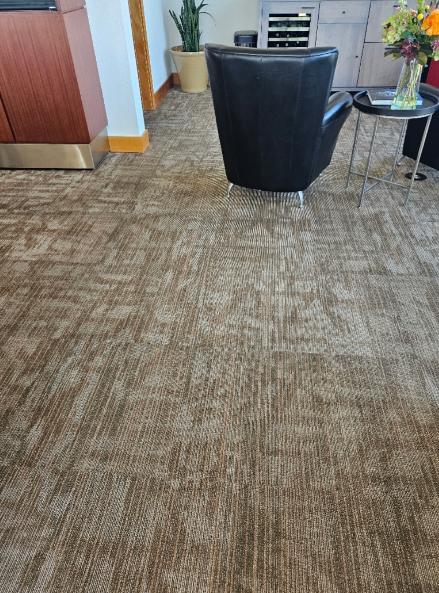 An image of a clean carpet in a room